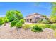 Beautiful two-story home featuring desert landscaping and a covered patio, perfect for outdoor living at 2383 E Zion Way, Chandler, AZ 85249
