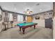 Spacious game room featuring a pool table, a ceiling fan, and carpet at 2383 E Zion Way, Chandler, AZ 85249