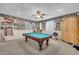 Spacious game room featuring a pool table, a ceiling fan, and carpet at 2383 E Zion Way, Chandler, AZ 85249
