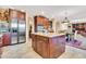 Spacious kitchen with a center island, stainless steel appliances, and a breakfast nook at 2383 E Zion Way, Chandler, AZ 85249