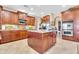 Large kitchen with a center island, stainless steel appliances, and plenty of storage at 2383 E Zion Way, Chandler, AZ 85249