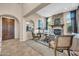 Elegant living room featuring a stone fireplace, modern decor, and stylish seating at 2383 E Zion Way, Chandler, AZ 85249