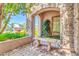 Charming patio area featuring stone accents and peaceful outdoor seating at 2383 E Zion Way, Chandler, AZ 85249