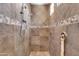 This bathroom features a custom tiled walk-in shower with dual shower heads and decorative trim at 2383 E Zion Way, Chandler, AZ 85249