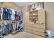 Organized walk-in closet with shelves, drawers, and hanging space at 2383 E Zion Way, Chandler, AZ 85249
