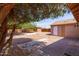Spacious backyard featuring mature trees, a storage shed, and brick patio, perfect for outdoor entertaining at 240 N Monte Vista St, Chandler, AZ 85225