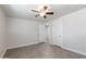 Bedroom featuring neutral paint, modern ceiling fan, and wood-look tile flooring at 240 N Monte Vista St, Chandler, AZ 85225