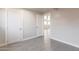 Bedroom with modern flooring, base trim and neutral paint, offering a bright and airy feel at 240 N Monte Vista St, Chandler, AZ 85225