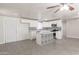 Updated kitchen featuring white cabinets, stainless steel appliances, and trendy backsplash at 240 N Monte Vista St, Chandler, AZ 85225