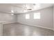 Living room with bright, neutral paint, light filled windows, and tile flooring at 240 N Monte Vista St, Chandler, AZ 85225
