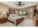 Inviting bedroom with bay window and plush carpet, creating a tranquil retreat at 27244 W Potter Dr, Buckeye, AZ 85396