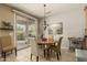 Bright dining area adjacent to patio, offers a relaxed atmosphere for meals at 27244 W Potter Dr, Buckeye, AZ 85396