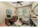 This home office provides a practical workstation setup to work and read in comfort and convenience at 27244 W Potter Dr, Buckeye, AZ 85396