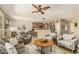 Open-concept living room flows into kitchen, perfect for entertaining guests and creating a welcoming space at 27244 W Potter Dr, Buckeye, AZ 85396