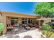 Charming covered patio with comfortable seating and outdoor dining area for entertaining at 27244 W Potter Dr, Buckeye, AZ 85396