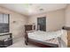 Neutral bedroom featuring a ceiling fan, a window, and a twin bed at 2748 E Dennisport Ave, Gilbert, AZ 85295