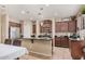 Well-appointed kitchen with granite countertops, stainless steel appliances, and dark cabinetry at 2748 E Dennisport Ave, Gilbert, AZ 85295