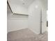 An empty walk-in closet providing ample storage space at 32693 N Jasper St, San Tan Valley, AZ 85143