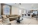 Inviting living area showcases an open layout, modern furnishings, and seamless transition to the adjacent kitchen space at 32693 N Jasper St, San Tan Valley, AZ 85143