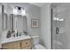Stylish bathroom featuring a vanity, toilet, and shower with glass enclosure at 3624 N Paseo Del Sol --, Mesa, AZ 85207