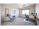 Bedroom featuring plush neutral carpet and a blue office chair, a work desk, and a ceiling fan at 3633 W Redfield Rd, Phoenix, AZ 85053