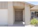 Inviting home entrance featuring double doors, brick accents, and a bright, welcoming feel at 3633 W Redfield Rd, Phoenix, AZ 85053