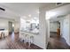 Open kitchen area with a breakfast bar, stainless steel appliances, and modern finishes at 3633 W Redfield Rd, Phoenix, AZ 85053