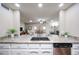Kitchen with granite countertops, stainless steel appliances and a view to other living spaces at 3633 W Redfield Rd, Phoenix, AZ 85053