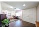 Cozy living room featuring hardwood floors, natural light, and a warm, inviting atmosphere at 3633 W Redfield Rd, Phoenix, AZ 85053