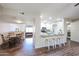 Open concept living area showcases modern kitchen and a separate dining area at 3633 W Redfield Rd, Phoenix, AZ 85053