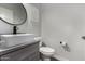 Stylish half bathroom featuring modern fixtures and contemporary design at 41678 N Salix Dr, San Tan Valley, AZ 85140