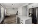 Modern kitchen featuring stainless steel appliances and an island at 41678 N Salix Dr, San Tan Valley, AZ 85140