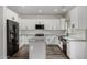 Stylish modern kitchen with stainless steel appliances and ample counter space at 41678 N Salix Dr, San Tan Valley, AZ 85140