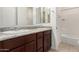 Bathroom with double sink vanity and granite countertops at 4571 N Arbor Way, Buckeye, AZ 85396