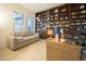 Cozy home office with custom built-ins, desk space, and natural light at 4571 N Arbor Way, Buckeye, AZ 85396