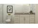 Well-lit bathroom features a vanity with ample storage and a modern toilet at 4642 E Topaz Dr, San Tan Valley, AZ 85143