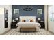 Beautiful bedroom with a stylish bed, large windows, and chic decor at 4642 E Topaz Dr, San Tan Valley, AZ 85143