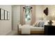 This charming bedroom features natural light, a unique chandelier, and cozy decor at 4695 E Topaz Dr, San Tan Valley, AZ 85143