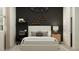 A peaceful bedroom featuring a modern workspace, mountain decor, and comfortable sleeping space at 4695 E Topaz Dr, San Tan Valley, AZ 85143