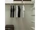 A tidy closet system with hanging rods, shelves, and ample space for organization at 4695 E Topaz Dr, San Tan Valley, AZ 85143