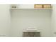 Neat walk-in closet providing ample storage space and organization with shelves and storage for towels and baskets at 4695 E Topaz Dr, San Tan Valley, AZ 85143
