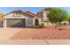 Charming two-story home with a well-maintained landscape, tile roof, and welcoming front entrance at 47 W Calle Monte Vis, Tempe, AZ 85284