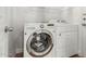 Well-lit laundry room featuring modern washer and dryer and neutral paint at 47 W Calle Monte Vis, Tempe, AZ 85284