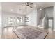 Spacious living room with stairs, hardwood floors, shiplap wall, recessed lighting, and exterior views at 47 W Calle Monte Vis, Tempe, AZ 85284