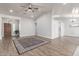 Bright living room with hardwood floors, recessed lighting, an entryway, and access to other living spaces at 47 W Calle Monte Vis, Tempe, AZ 85284
