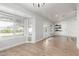 Spacious living room with abundant natural light, wood floors, and bright white paint at 47 W Calle Monte Vis, Tempe, AZ 85284