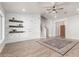 Inviting living room with hardwood floors, shiplap wall, recessed lighting, and staircase at 47 W Calle Monte Vis, Tempe, AZ 85284