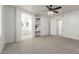 Spacious main bedroom with access to bathroom, including built-in shelves at 47 W Calle Monte Vis, Tempe, AZ 85284