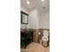 Bathroom with decorative glass bowl sink and backsplash at 4730 N 111Th Ln, Phoenix, AZ 85037