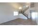 Bright entryway with stairs leading to the second floor at 4730 N 111Th Ln, Phoenix, AZ 85037